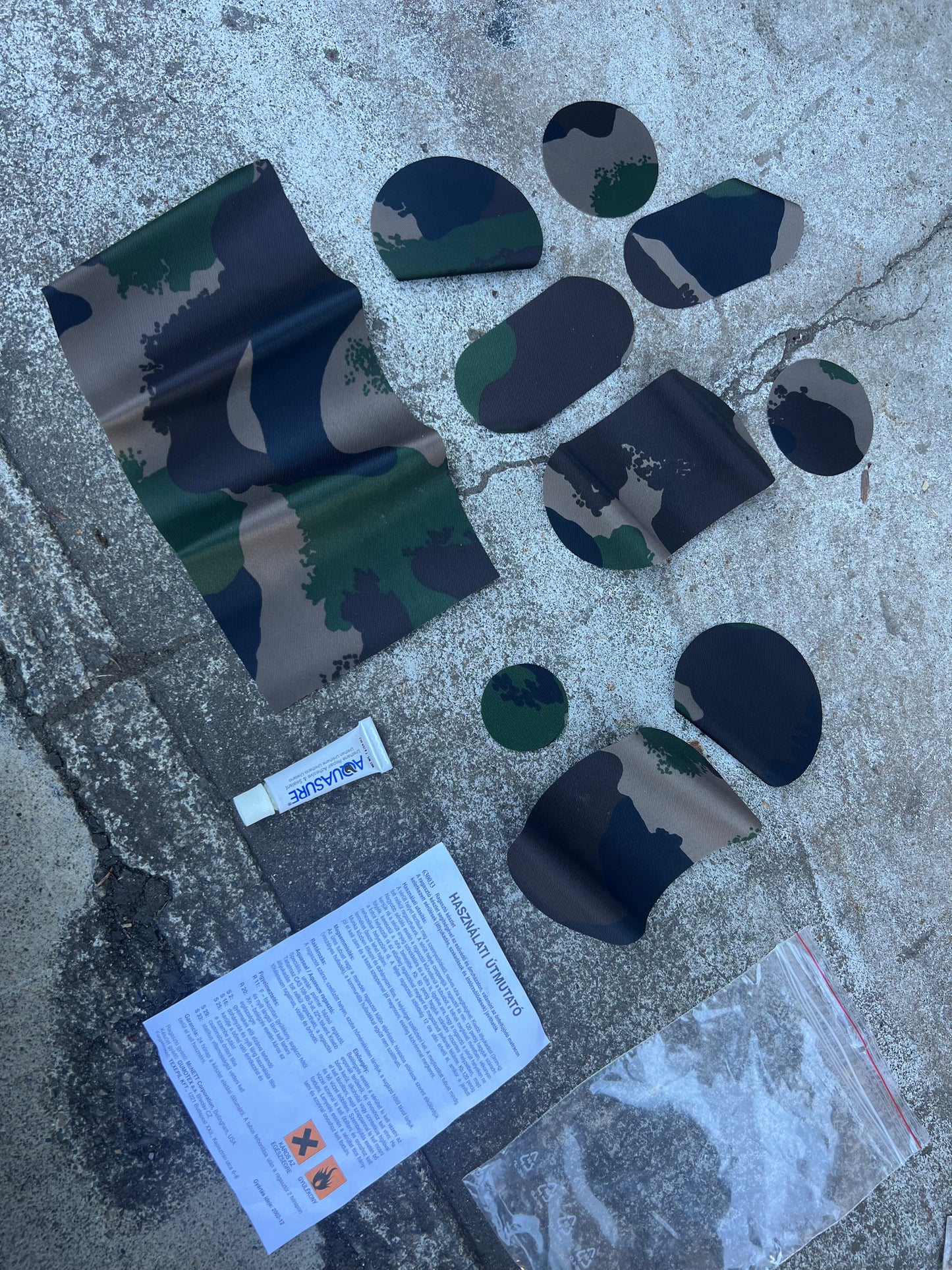 US surplus WET WEATHER PATCH KIT woodland camouflage repair pannels. (Various sizes included)